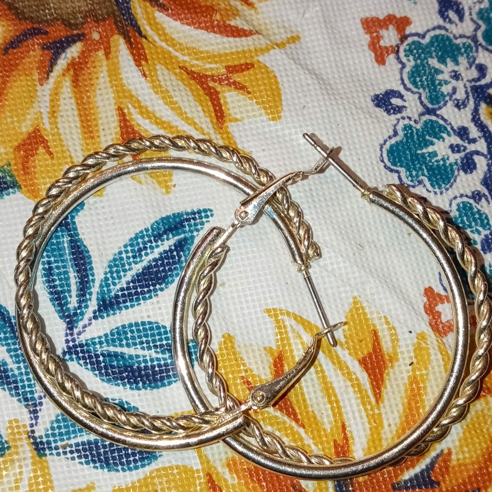 Silver hoop earring never worn